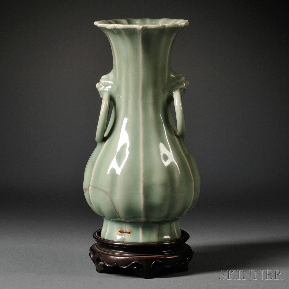 Appraisal: Celadon Ribbed Vase China th th century pear-shape body with