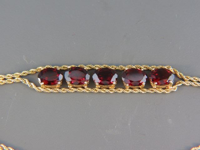 Appraisal: Garnet Bracelet fine rich oval gems totaling carats in k