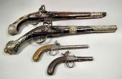 Appraisal: An th th Century Turkish silvery metal mounted flintlock pistol