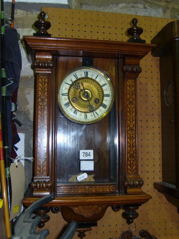 Appraisal: A small th century walnut wall clock with floral stencilled