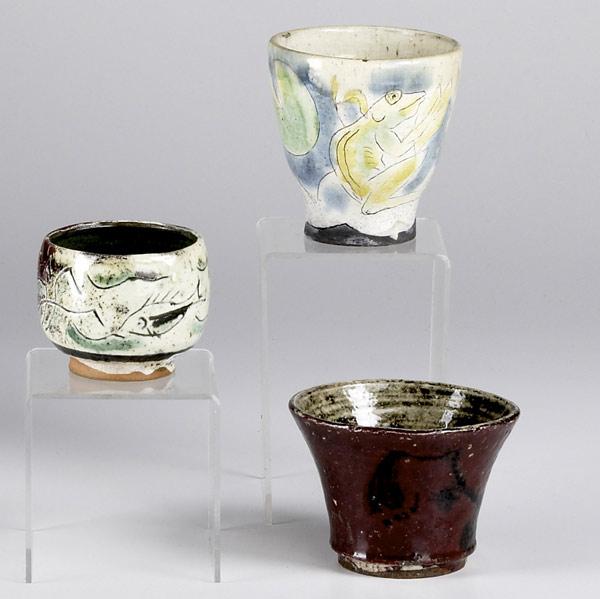 Appraisal: HENRY VARNUM POOR Three cups one with lily pad decoration