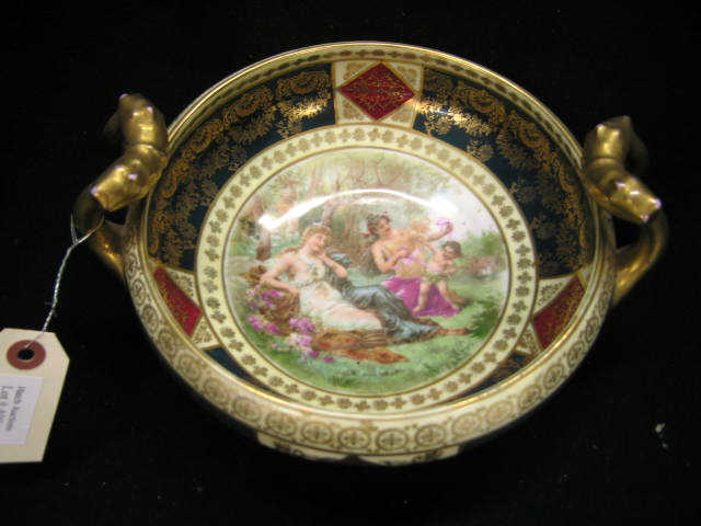 Appraisal: Austria Beehive Porcelain Bowl curved handles maidens and cherub