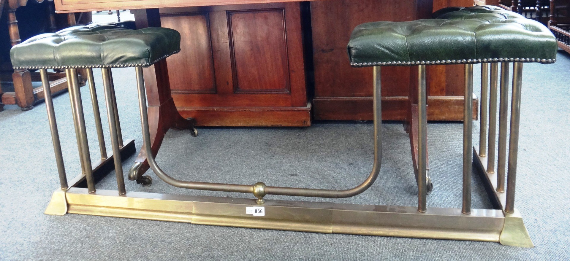 Appraisal: A Victorian style gilt metal and green leatherette upholstered adjustable