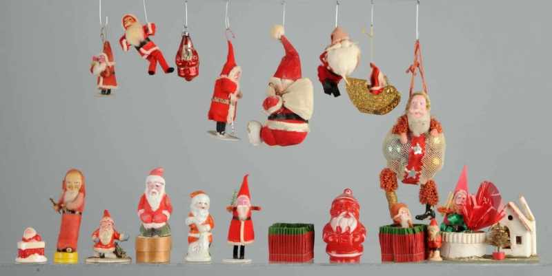 Appraisal: Lot of Santa Figurines Description Felt composition and one porcelain