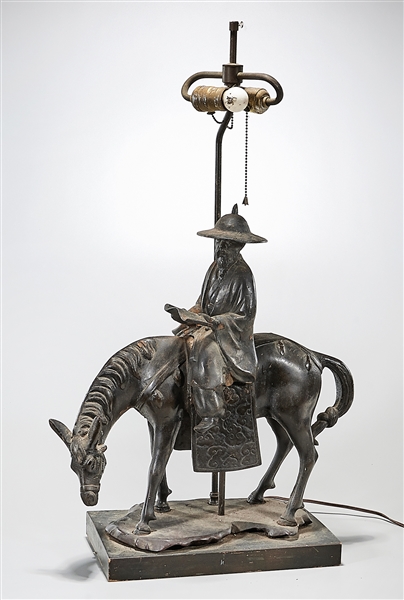 Appraisal: Chinese lamp bronze sculpture of a scholar on horseback x