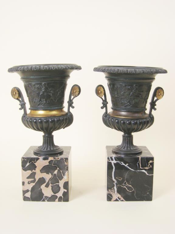 Appraisal: A pair of Regency bronze Urns egg and dart rims