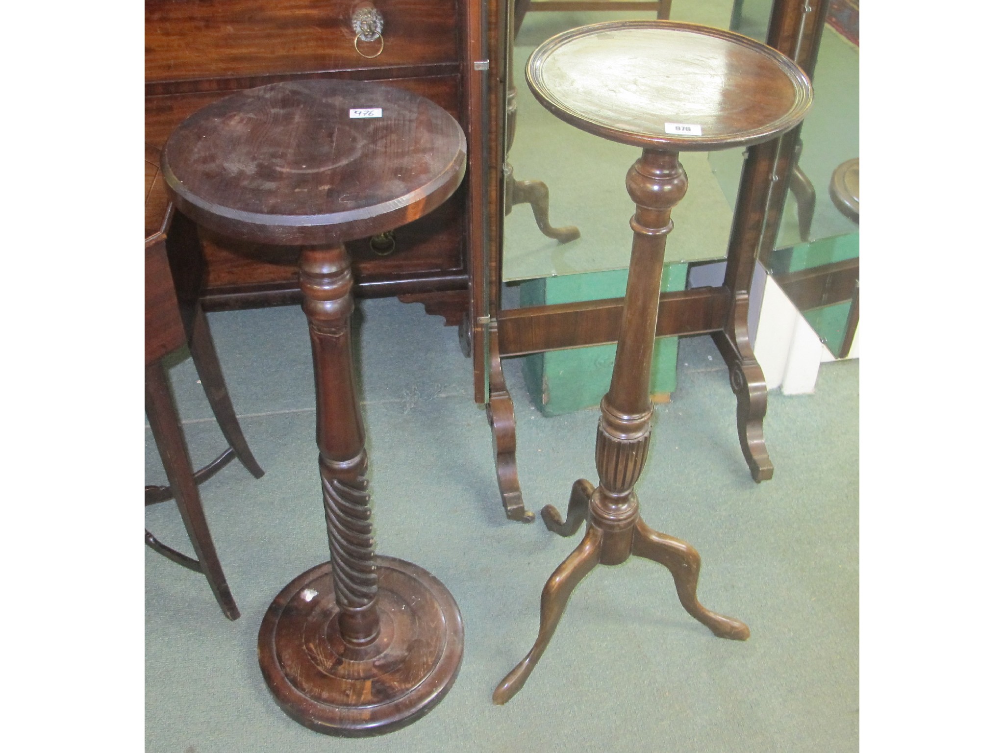 Appraisal: Two mahogany plant stands one with tripod base