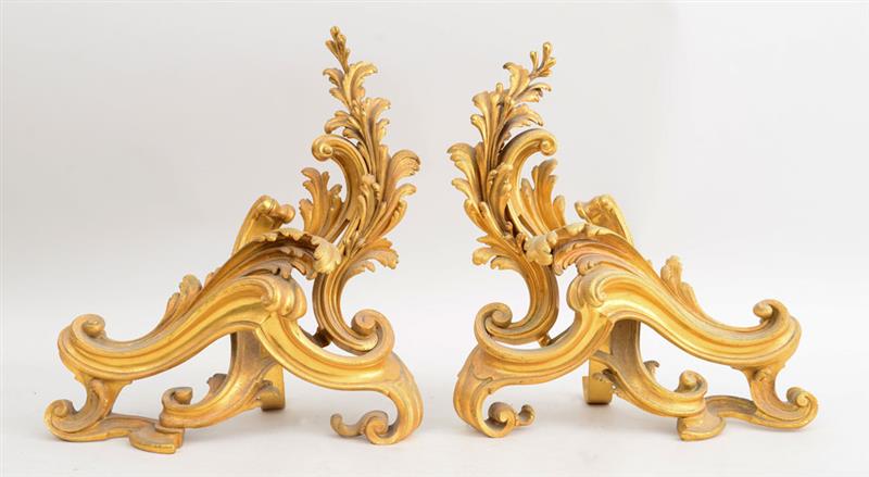 Appraisal: PAIR OF LOUIS XV STYLE GILT-BRONZE CHENETS Each incorporating tiered