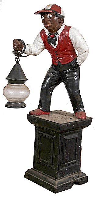 Appraisal: CAST IRON LIGHTED LAWN JOCKEY CAST IRON LIGHTED LAWN JOCKEY