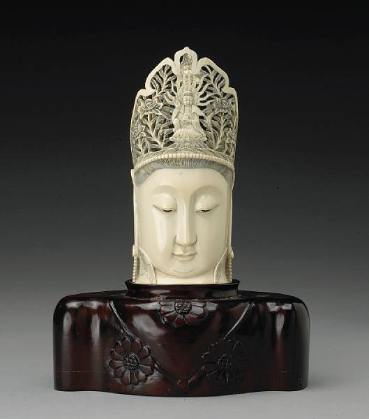 Appraisal: A tinted ivory head of Guanyin th Century The face