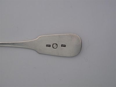 Appraisal: ALEXANDER MOLLISON A fiddle sugar spoon c oz Erased crest