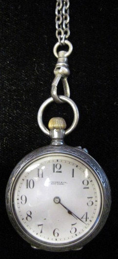 Appraisal: Sterling silver pocket watch Tiffany Co Circular highly chased case