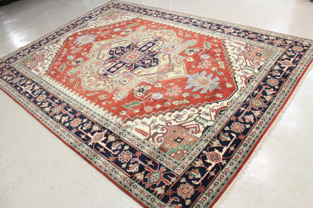 Appraisal: HAND KNOTTED ORIENTAL CARPET Persian Serapi or Heriz design centering