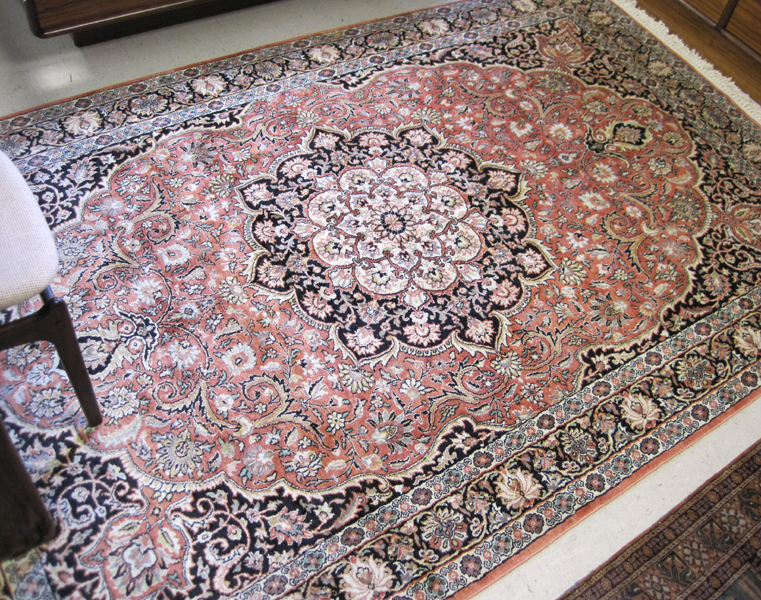 Appraisal: HAND KNOTTED ORIENTAL CARPET Indo-Persian faux silk floral and central