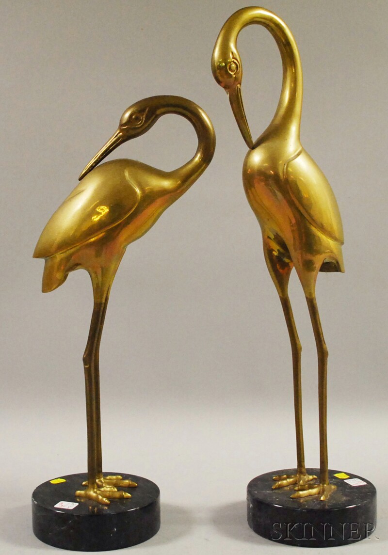 Appraisal: Pair of Art Deco-style Brass Herons with black marble bases