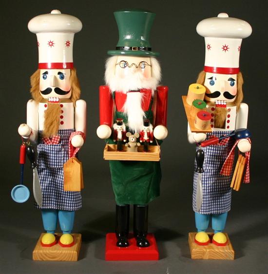 Appraisal: Group of three modern nutcrackers Consisting of a pair of