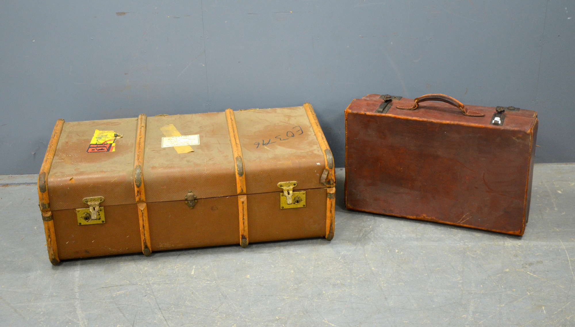 Appraisal: Leather suite case a trunk and a mirror