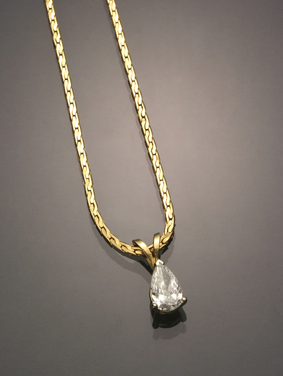 Appraisal: -Karat Yellow-Gold Solitaire Diamond Pendant and Chain The five-prong A-box