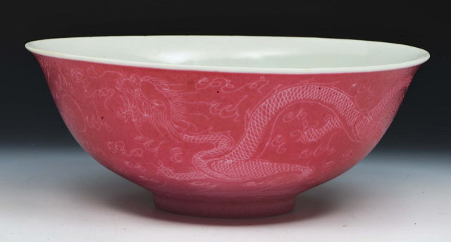 Appraisal: A CHINESE PORCELAIN MONOCHROME BOWL decorated with a cerise glaze