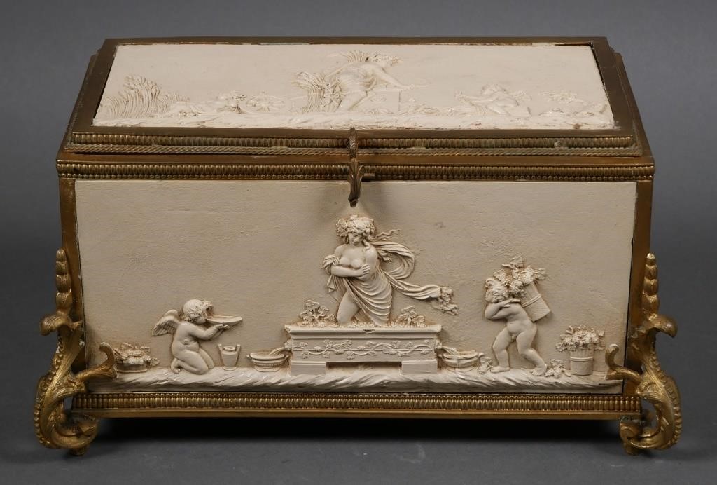 Appraisal: Ormolu frame with five cast material panels depicting cherubs nudes