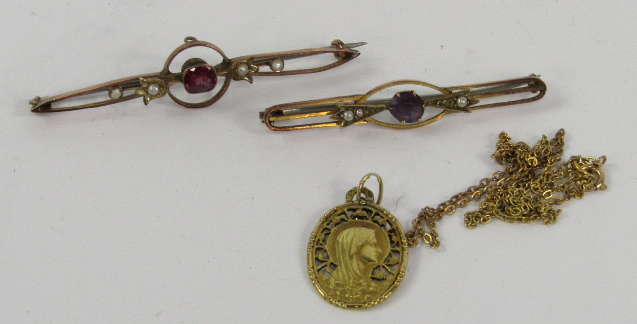 Appraisal: Two Edwardian yellow metal and seed pearl bar brooches one