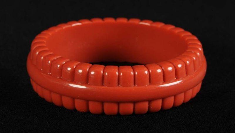 Appraisal: Bakelite Brick Colored Carved Bracelet Condition Near Mint Size Dia