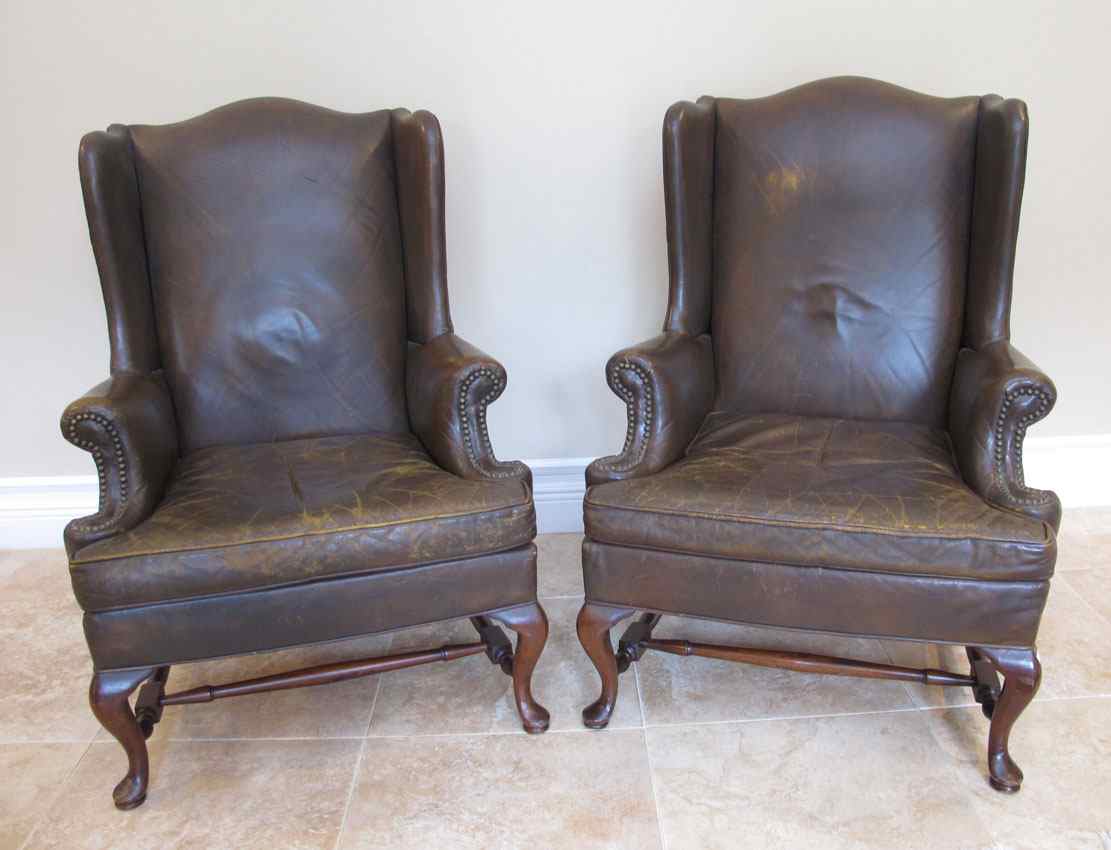 Appraisal: PAIR HICKORY CHAIR CO LEATHER WING BACK CHAIRS Decorative tacked