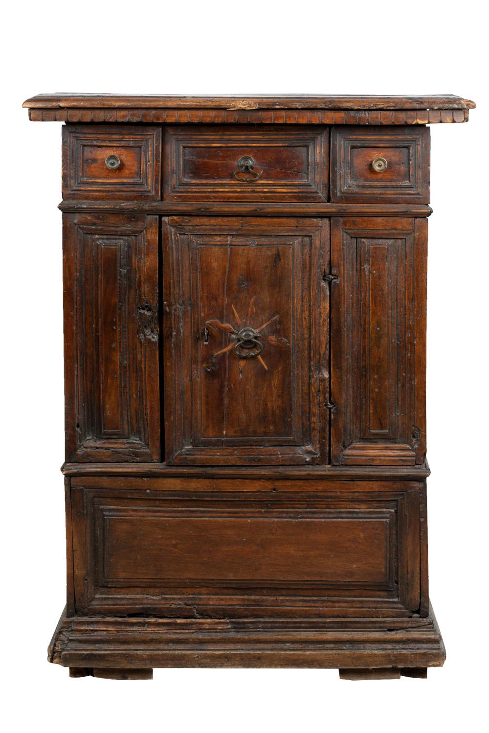 Appraisal: NORTH ITALIAN BAROQUE CARVED WALNUT CABINETthe rectangular top with a