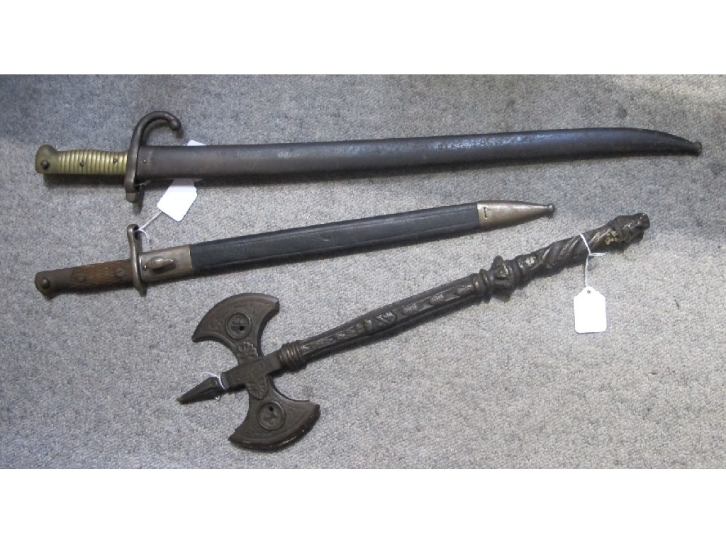 Appraisal: Lot comprising two bayonets and an ornamental axe