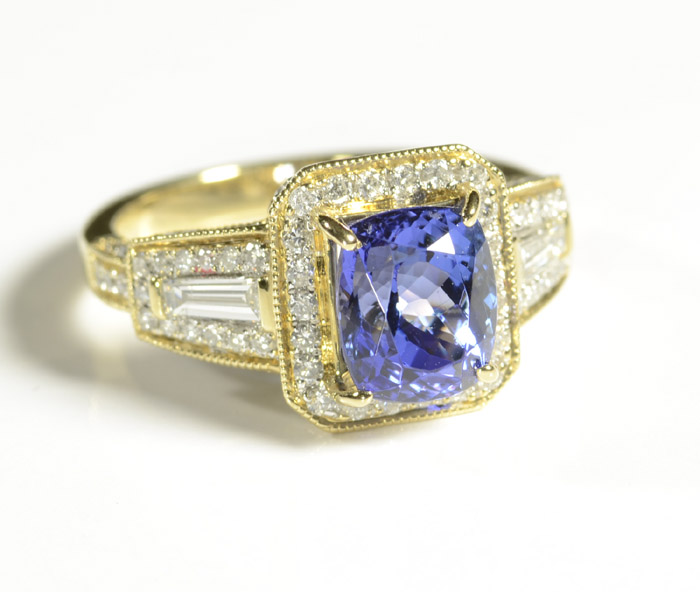 Appraisal: TANZANITE DIAMOND AND FOURTEEN KARAT GOLD RING centering a single