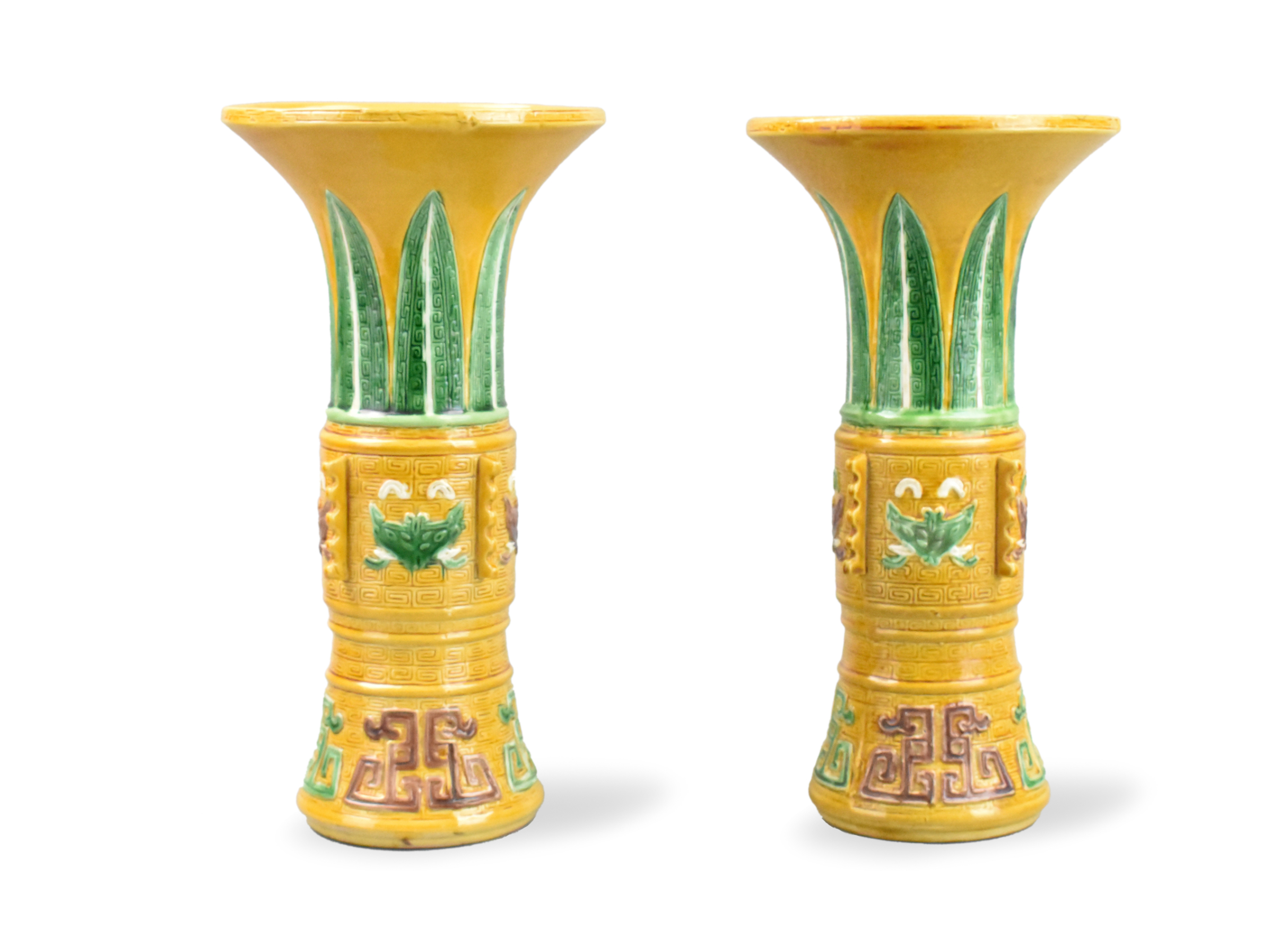 Appraisal: A pair of Chinese sancai glazed gu vases dating from