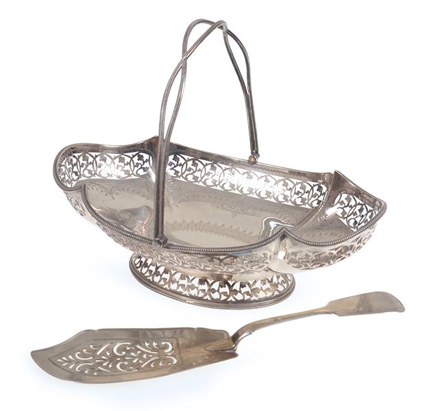 Appraisal: A STERLING SILVER CAKE BASKET TOGETHER WITH A PIERCED CAKE