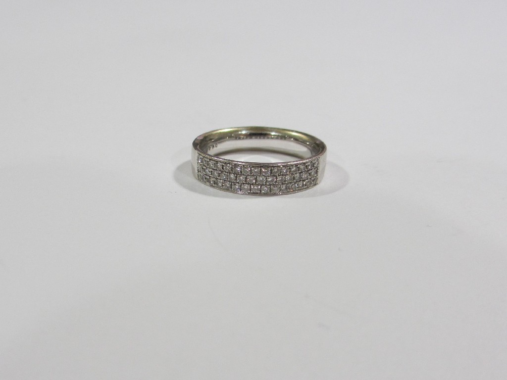 Appraisal: Eighteen carat white gold pave set diamond triple row half