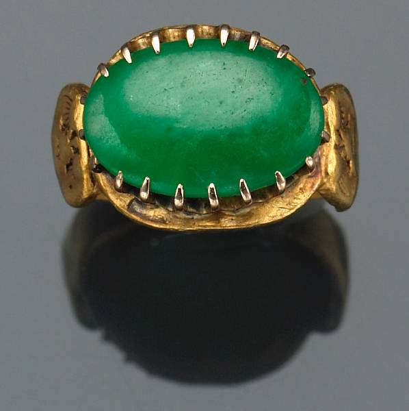 Appraisal: A jadeite jade and high karat gold ring jade measuring