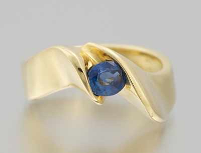 Appraisal: A Ladies' Sapphire Ring k yellow gold sculpted design ring