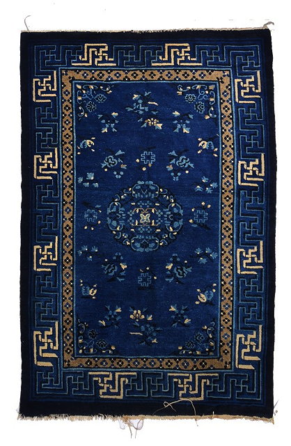 Appraisal: AN OLD CHINESE BLUE AND WHITE SMALL CARPET with a