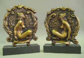 Appraisal: PAIR OF BOOKENDS Norman Lindsay Sculpture of a seated nude