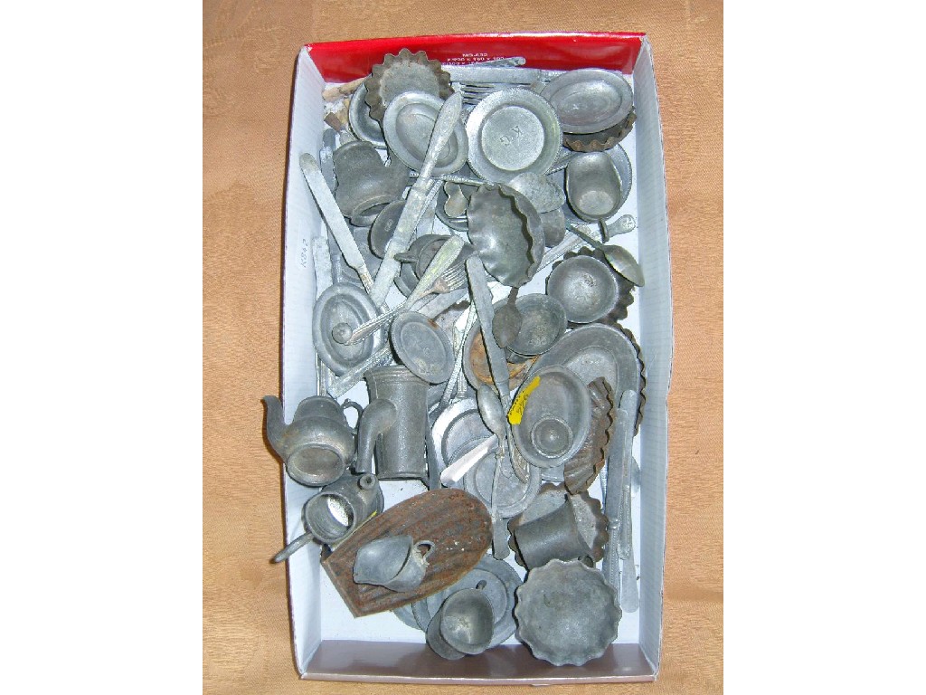 Appraisal: A quantity of miniature tin dinner wares including flatware dishes