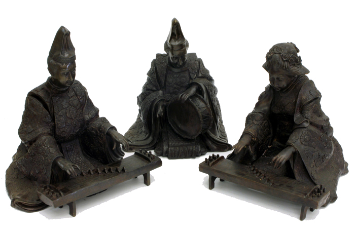 Appraisal: THREE CHINESE BRONZE SEATED MUSICAL GROUP a man and woman