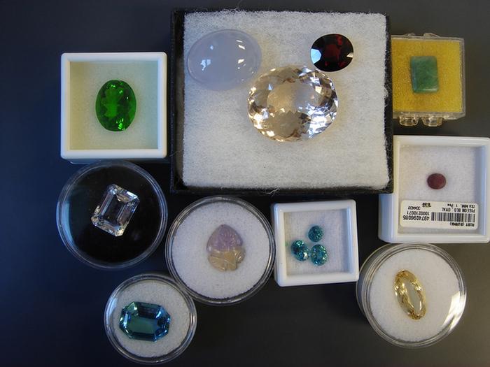 Appraisal: Grouping of Unset Gems Including ruby zircon chalcedony ametrine moldavite