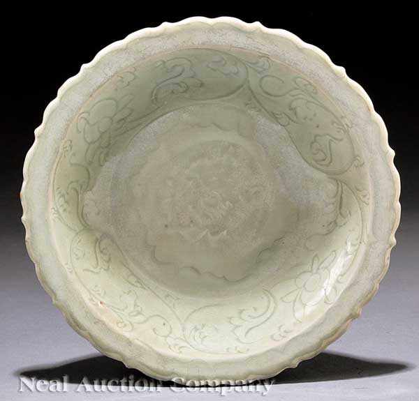 Appraisal: A Chinese Longquan Celadon Barbed Rim Dish Ming Dynasty -