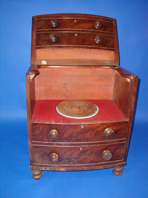 Appraisal: A mid thC mahogany bow front commode modelled with four