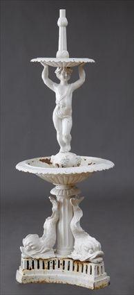 Appraisal: AMERICAN TWO-TIER CAST-IRON FOUNTAIN The upper tazza supported by a