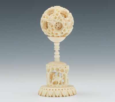 Appraisal: A Carved Ivory Puzzle Ball Carved puzzle ball with several