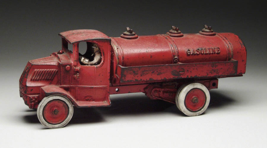 Appraisal: LARGE ARCADE MACK GASOLINE TRUCK Red gasoline truck with cast