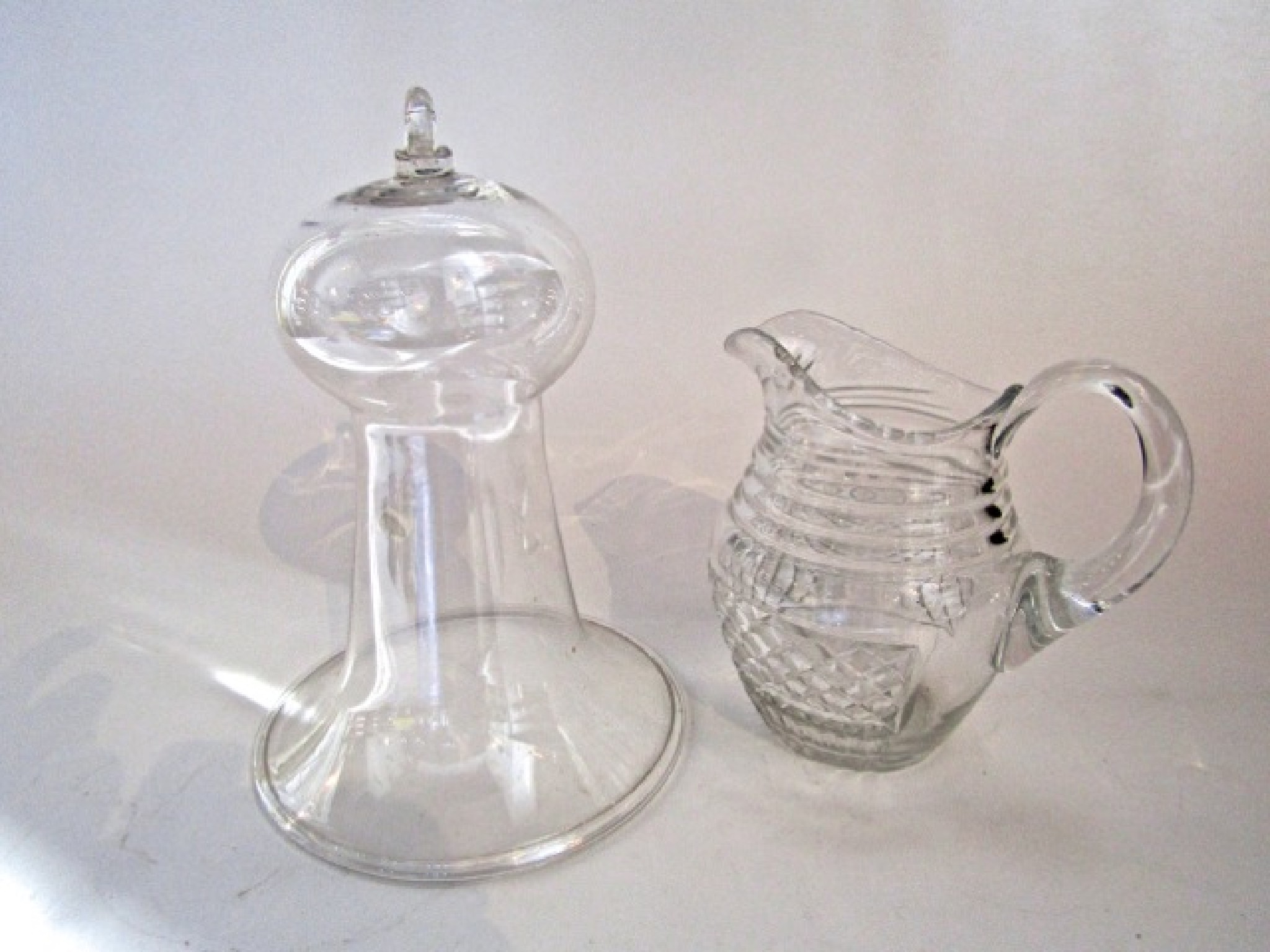 Appraisal: A good quality hanging hand blown clear glass smoke bell