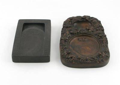 Appraisal: Two inkstones one moulded with dragons with a three character