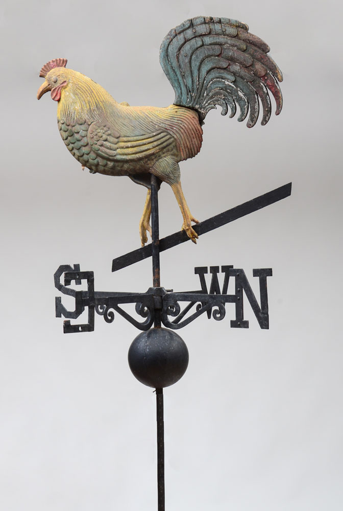 Appraisal: PAINTED CAST-IRON AND WOOD ROOSTER WEATHERVANE Fitted with directionals on