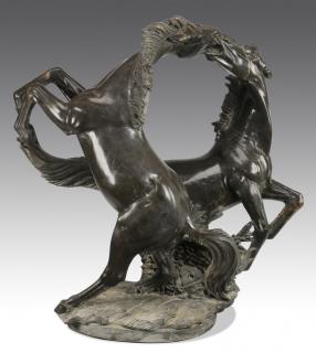 Appraisal: Carved marble sculpture of two horses h Carved black marble