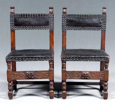 Appraisal: Pair leather upholstered chairs Baroque with leather upholstered backs and